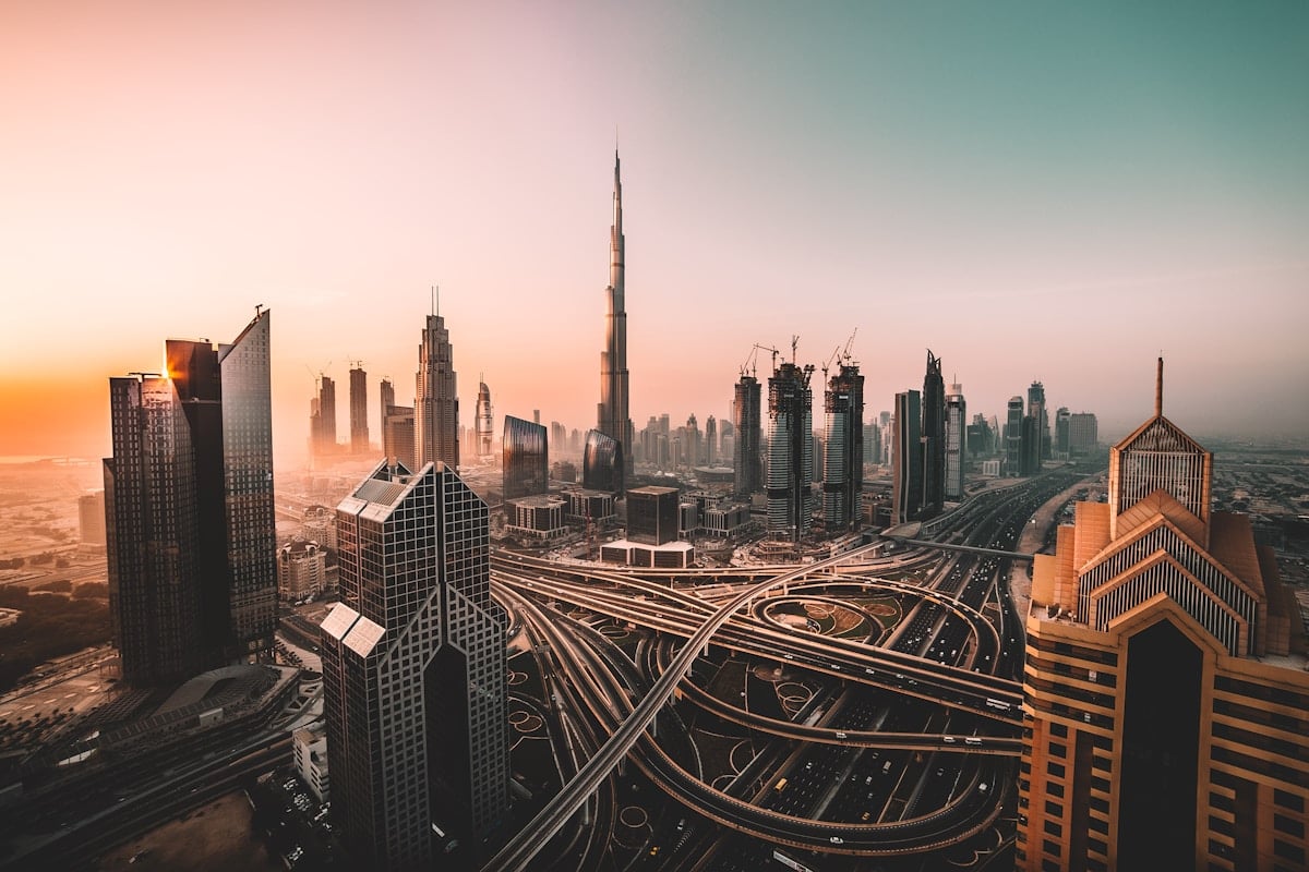 Modern Gulf city skyline for UAE and Oman visa services
